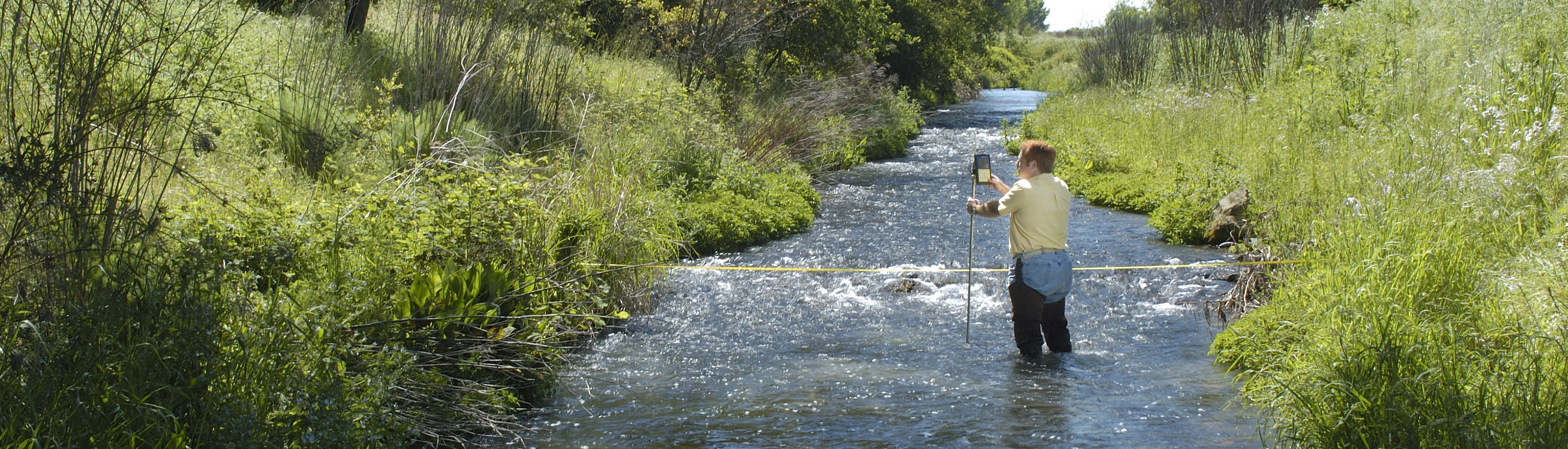 AquaCalc Pro Plus in Big Stream Wading Full Height AquaCalc Pro Plus in Big Stream Wading Full Height